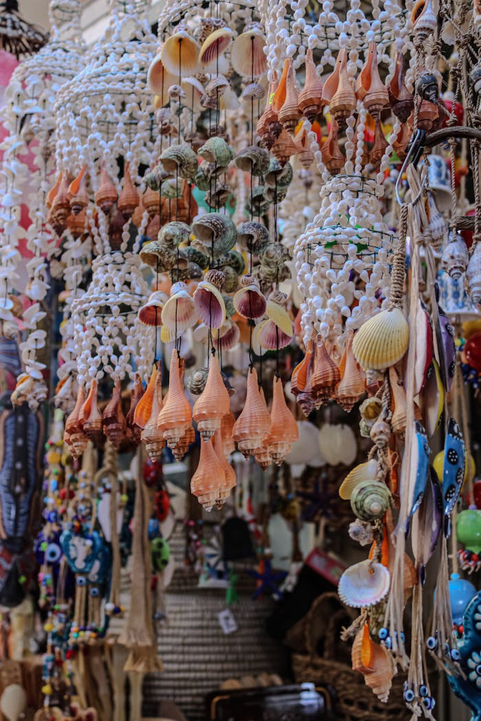 Vibrant collection of handmade souvenirs featuring seashells at a Turkish bazaar in Bartın.